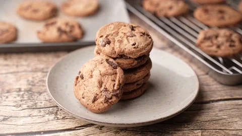 Stacked chocolate chip cookie in dark background Stock Footage 158775925