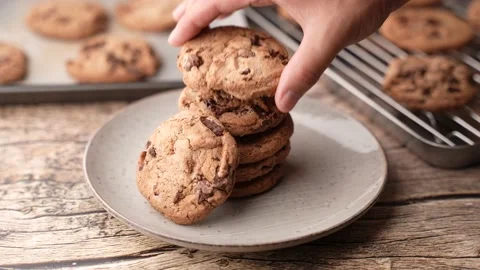 Stacked chocolate chip cookie in dark background Stock Footage 158776052