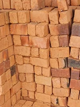 Stacked Clay Bricks Texture Background Stock-Fotos