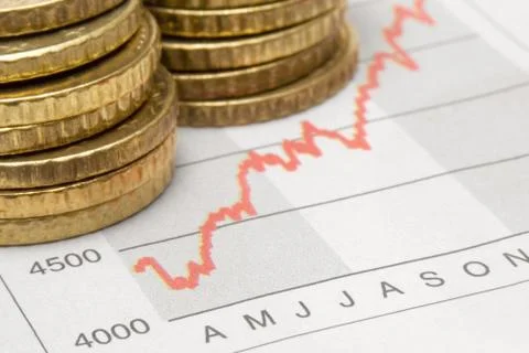 Stacked Coins on Chart Фото