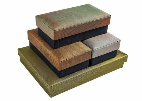 Stacked colored silk gift boxes Stock Photos