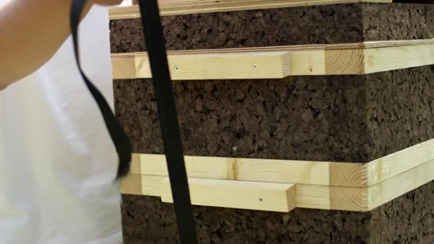 Stacked Cork Panels With Pine Battens and Black Strap, Indoor Storage, Close Up Stock-Footage 341295921
