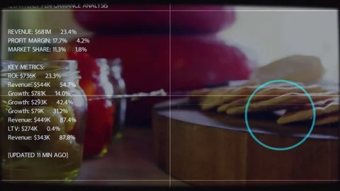 Stacked crackers on board, camera shifting left, HUD animating profits, cyan Stock Footage 333904919