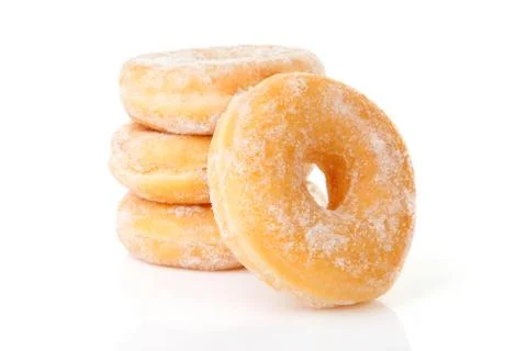 Stacked delicious sugared donuts Stock Photos