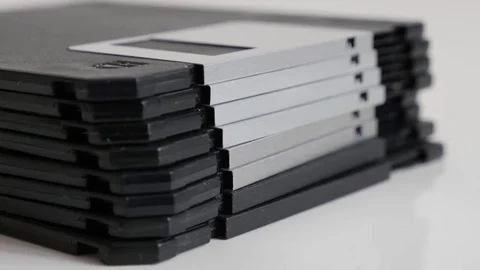 Stacked diskette data archives slow tilt Stock Footage 75770570