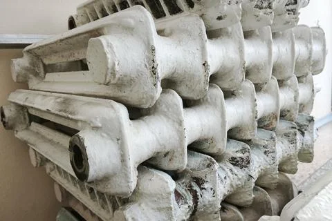 Stacked dismantled radiators ready for replacement Stock Photos