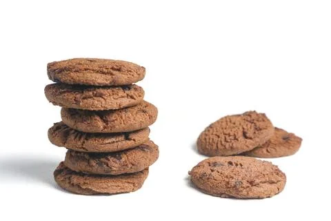 Stacked double choco round cookie biscuit with chocochips. Isolated on whit.. 스톡 사진