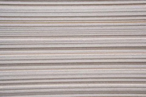 Stacked drywall sheets in a construction material store Stock Photos
