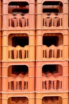 Stacked empty bottle crates Stock Photos