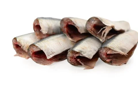 Stacked fish isolated on white background with neutral top-down perspective.. Stock Photos