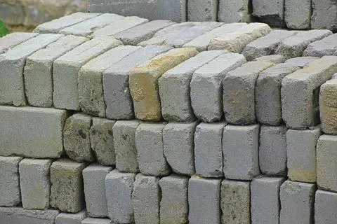 Stacked Fly Ash Bricks at an Infrastructure Construction Site Close Up 스톡 사진