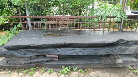 Stacked of giant flat log used as a seating place Stock Footage 263582275