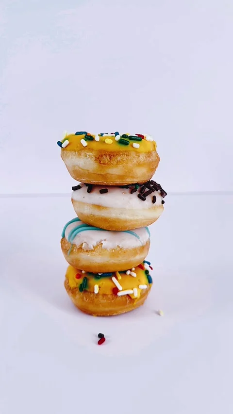 Stacked mini donuts Stock Footage 303928441