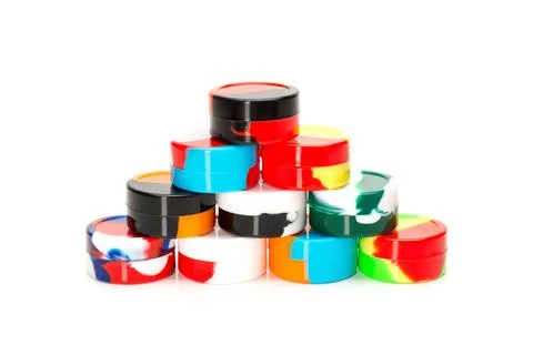 Stacked Multicolor Plastic Storage Containers on White Background Stock Photos