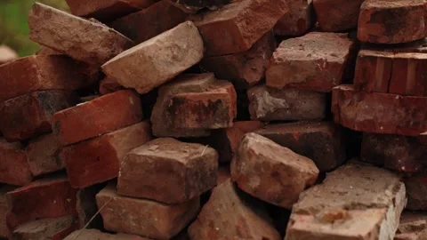 Stacked old red bricks in a pile outdoors Stock-Footage 347535795