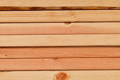 Stacked pine planks on side Stock Photos