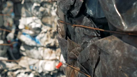 Stacked plastic garbage at a landfill, close up. Video stock 99082725