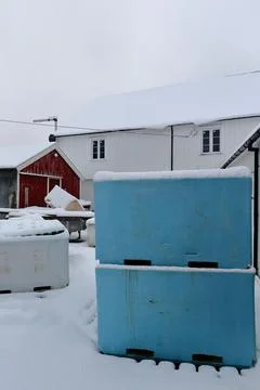 Stacked plastic pallet boxes for fish storage-port warehouse. Hamnoy-Lofoten-NO Stock Photos