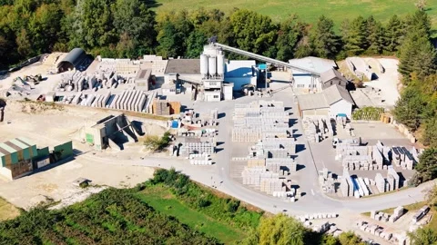 Stacked Precast Elements and Silo at Concrete Yard Stock Footage 347920383