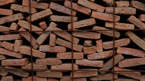 Stacked Red Clay Bricks in Construction Site Stock Footage 317291848