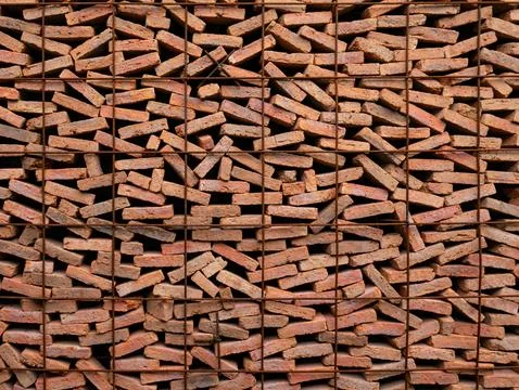 Stacked Red Clay Bricks in Construction Site - Traditional Building Materia.. 写真素材