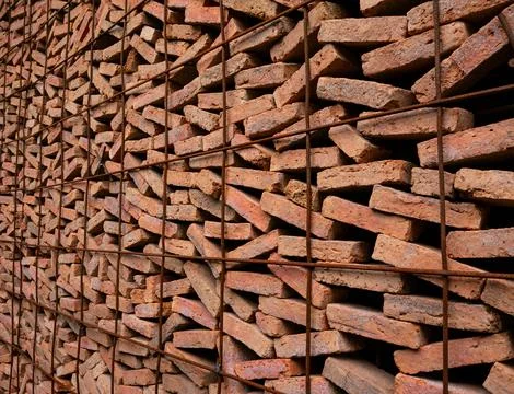 Stacked Red Clay Bricks in Construction Site - Traditional Building Materia.. Stockfoto's