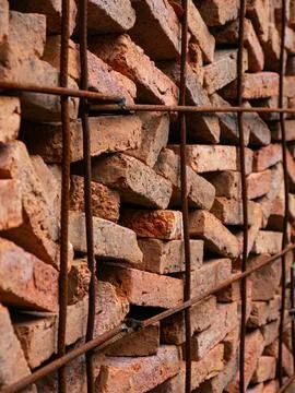 Stacked Red Clay Bricks in Construction Site - Traditional Building Materia.. Stockfoto's