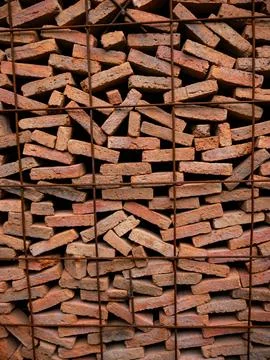 Stacked Red Clay Bricks in Construction Site - Traditional Building Materia.. 写真素材