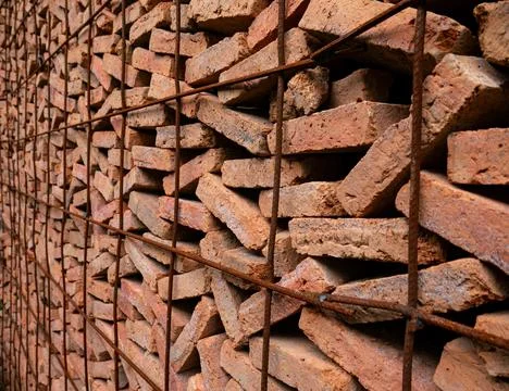 Stacked Red Clay Bricks in Construction Site - Traditional Building Materia.. Stock Photos