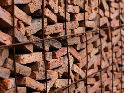 Stacked Red Clay Bricks in Construction Site - Traditional Building Materia.. Stockfoto's