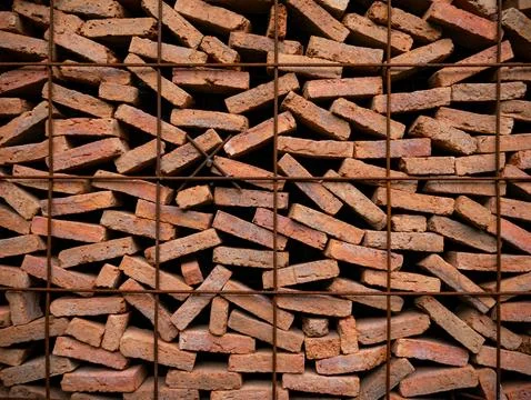 Stacked Red Clay Bricks in Construction Site - Traditional Building Materia.. Stock Photos