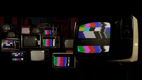 Stacked Retro TVs With Analog Glitch, Color Test Pattern and Static Noise - 4K Stock Footage 120156695