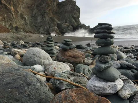 Stacked River Rocks on the Beach Stock Photos