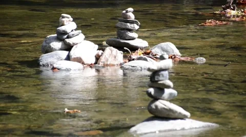 Stacked Rocks in a Creek Video stock 49962612