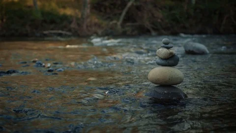 Stacked Rocks in Creek Stockbeeldmateriaal 73719431