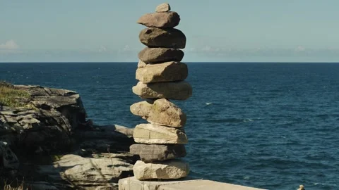 Stacked rocks at the sea slow motion 4K Stock Footage 274627650