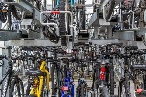 Stacked Rows of Commuter Bikes at a Train Station Stock Photos
