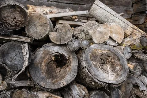 Stacked rustic firewood logs block pile Stock Photos