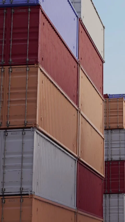 Stacked shipping containers at cargo terminal Vídeo Stock 328452047