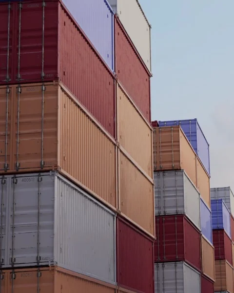 Stacked shipping containers at cargo terminal Vídeos de archivo 328452048