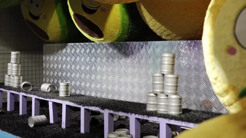 Stacked silver cans on a carnival game. Amusement park attraction. Video stock 330882411