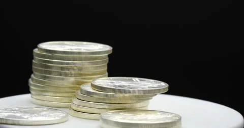 Stacked silver coins in a wealth and success concept Stock Footage 169682923