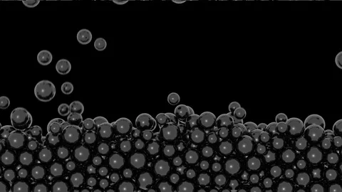 Stacked spheres background - falling small black pearls - on black (FULL HD) Stock Footage 75207035