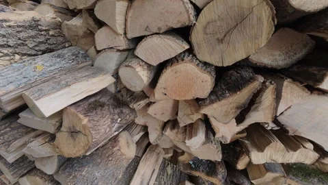 Stacked Split Firewood Logs Background for Winter Heating and Fuel 動画素材 347058200