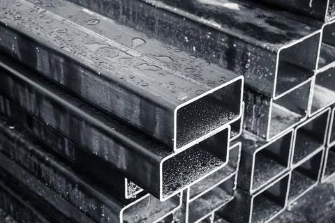 Stacked steel pipes with rectangular cross-section Stock Photos
