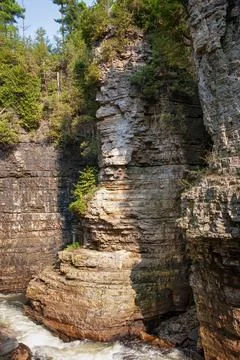 Stacked stone cliffside at Ausable Chasm in upstet NY. Stock Photos