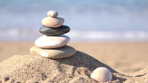 Stacked stones, relax on the beach Stock Footage 80604367