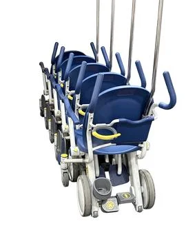 Stacked Strollers Highlighted On A White Background For Hospital Use Stock Photos