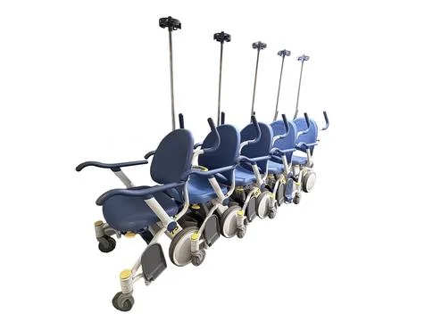 Stacked Strollers Highlighted On A White Background For Hospital Use Stock Photos