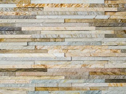 Stacked thin slate brick design background photograph,  multicolor. 写真素材